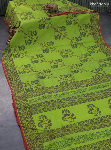 Silk cotton block printed saree light green and maroon shade with floral prints and printed border