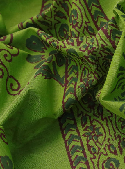 Silk cotton block printed saree light green and maroon shade with floral prints and printed border