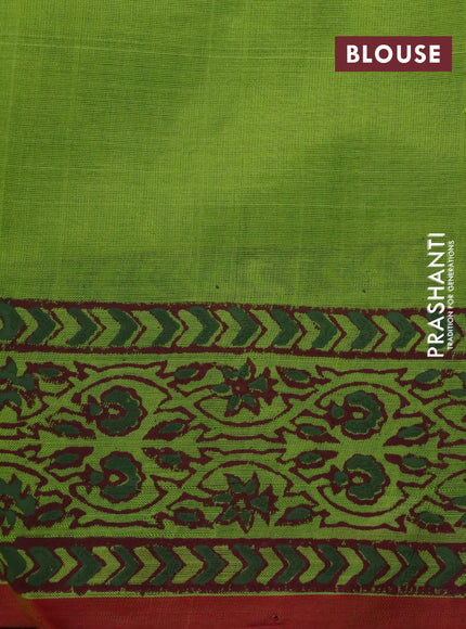 Silk cotton block printed saree light green and maroon shade with floral prints and printed border