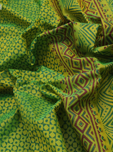 Silk cotton block printed saree light green with allover prints and printed border