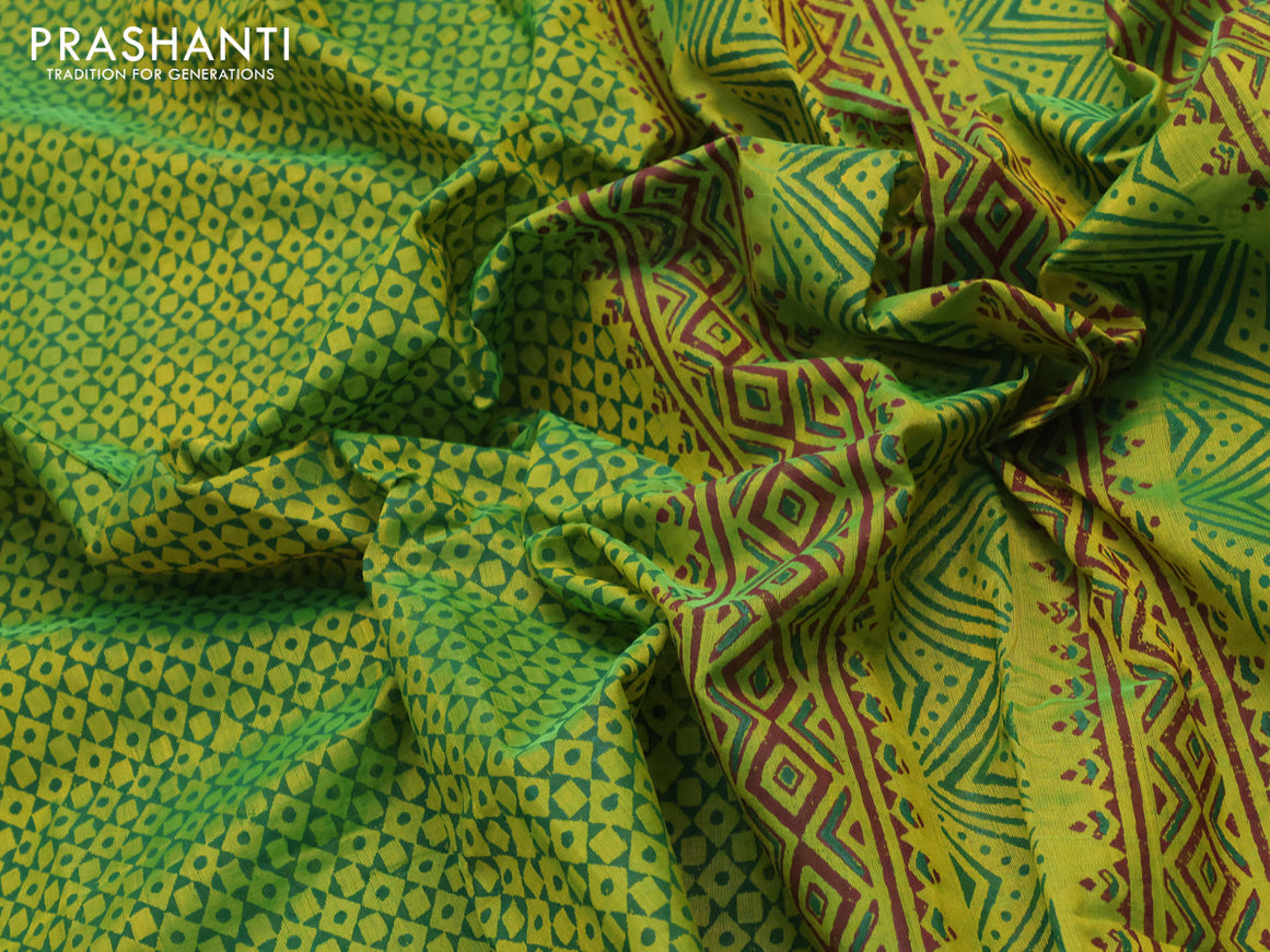 Silk cotton block printed saree light green with allover prints and printed border