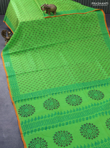 Silk cotton block printed saree light green and orange with allover butta prints and printed border