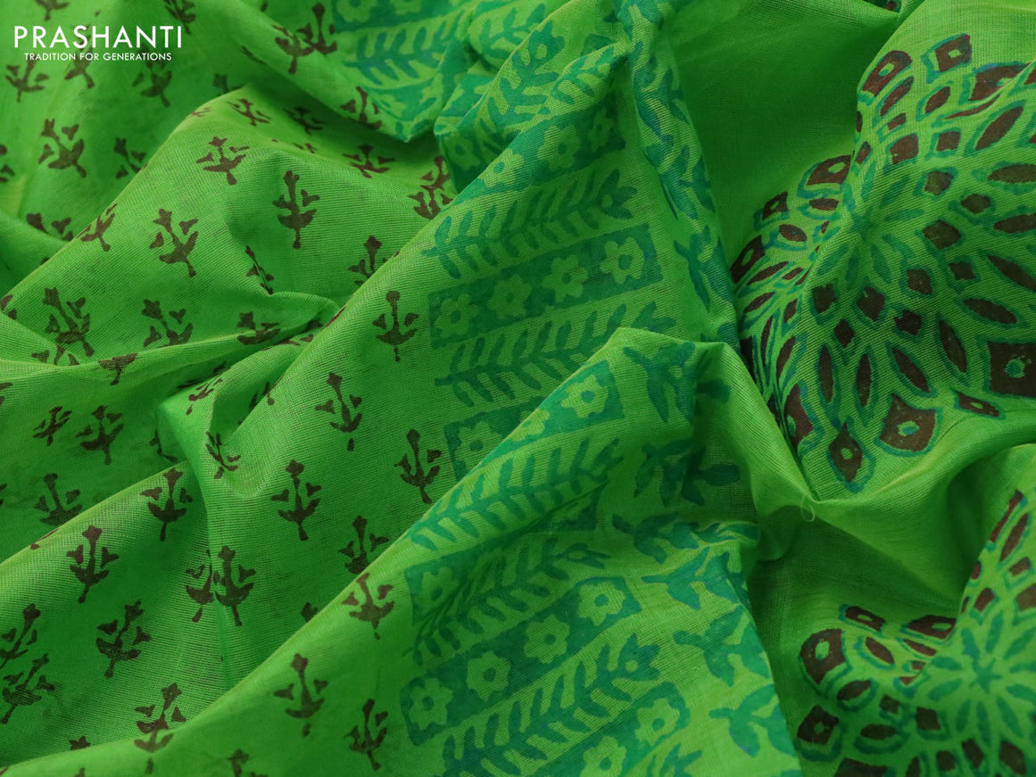 Silk cotton block printed saree light green and orange with allover butta prints and printed border