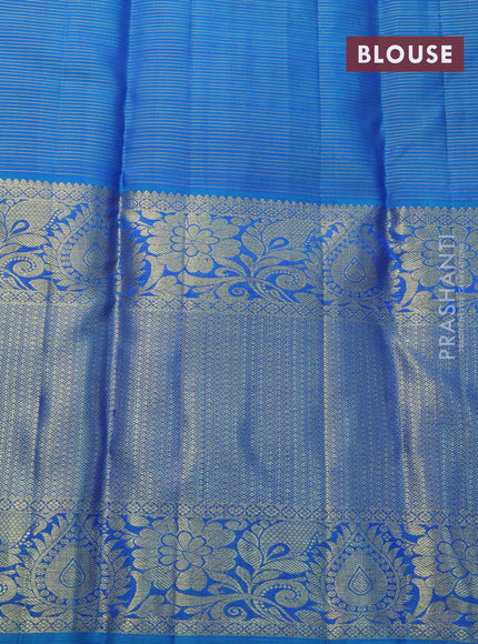 Pure kanjivaram silk saree blue and cs blue with allover zari woven stripes pattern and long zari woven border