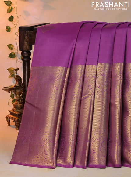 Pure kanjivaram silk saree lavender shade with zari woven buttas and long annam zari woven border