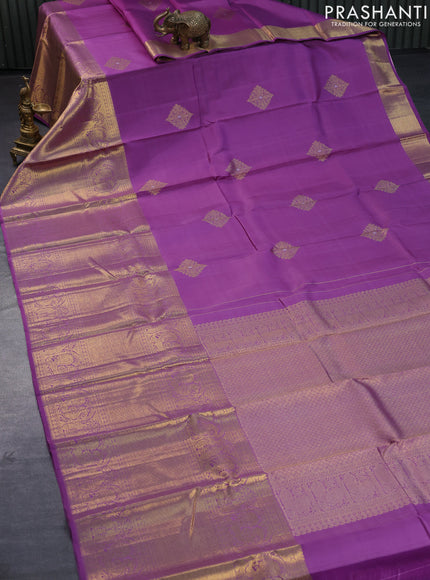 Pure kanjivaram silk saree lavender shade with zari woven buttas and long annam zari woven border