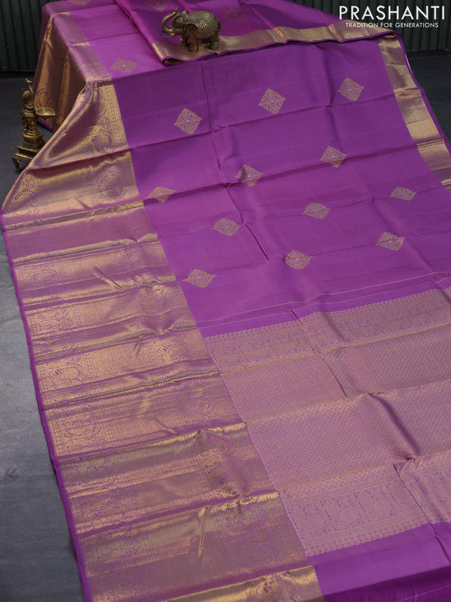 Pure kanjivaram silk saree lavender shade with zari woven buttas and long annam zari woven border