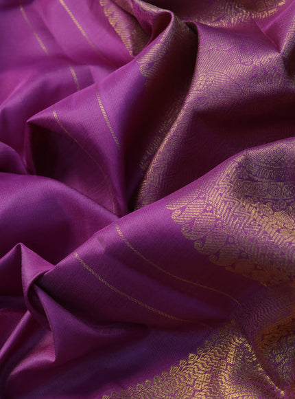 Pure kanjivaram silk saree lavender shade with zari woven buttas and long annam zari woven border