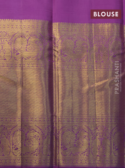 Pure kanjivaram silk saree lavender shade with zari woven buttas and long annam zari woven border