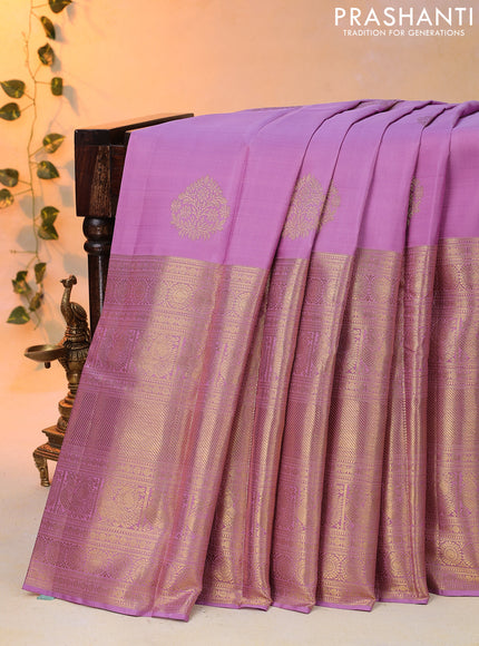 Pure kanjivaram silk saree lavender shade and deep violet with zari woven buttas and long annam zari woven border