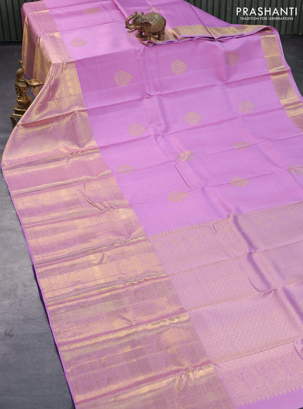 Pure kanjivaram silk saree lavender shade and deep violet with zari woven buttas and long annam zari woven border