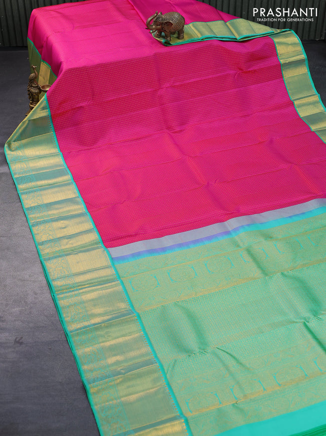 Pure kanjivaram silk saree pink and teal green with allover zari woven butta weaves and long zari woven korvai border