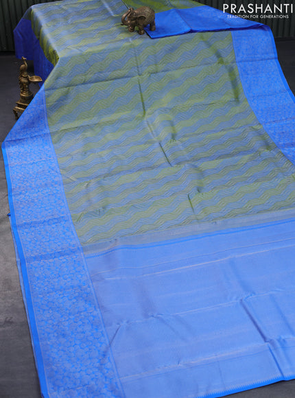 Pure kanjivaram tissue silk saree light green and cs blue with allover silver zari woven brocade weaves and silver zari woven border