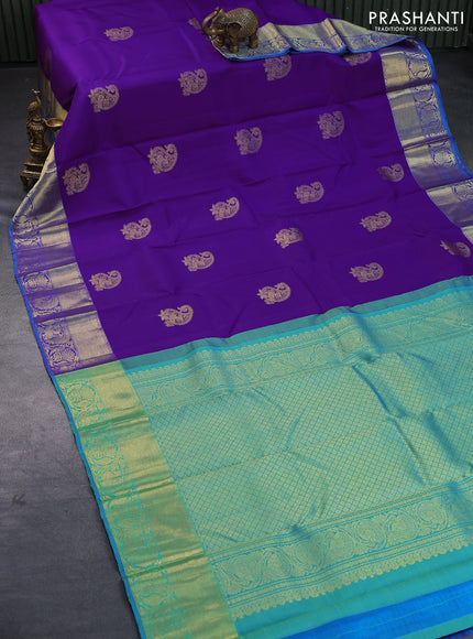 Pure kanjivaram silk saree violet and cs blue with zari woven paisley buttas and zari woven annam border