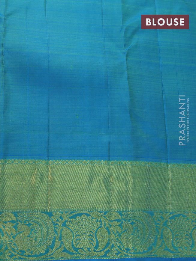 Pure kanjivaram silk saree violet and cs blue with zari woven paisley buttas and zari woven annam border