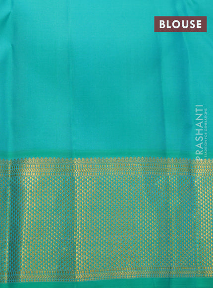 Pure kanjivaram silk saree orange and green with plain body and zari woven border