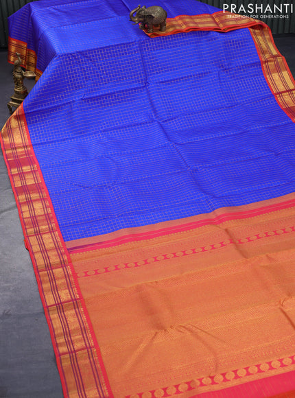 Pure kanjivaram silk saree blue and orange with allover zari checked pattern and annam zari woven border