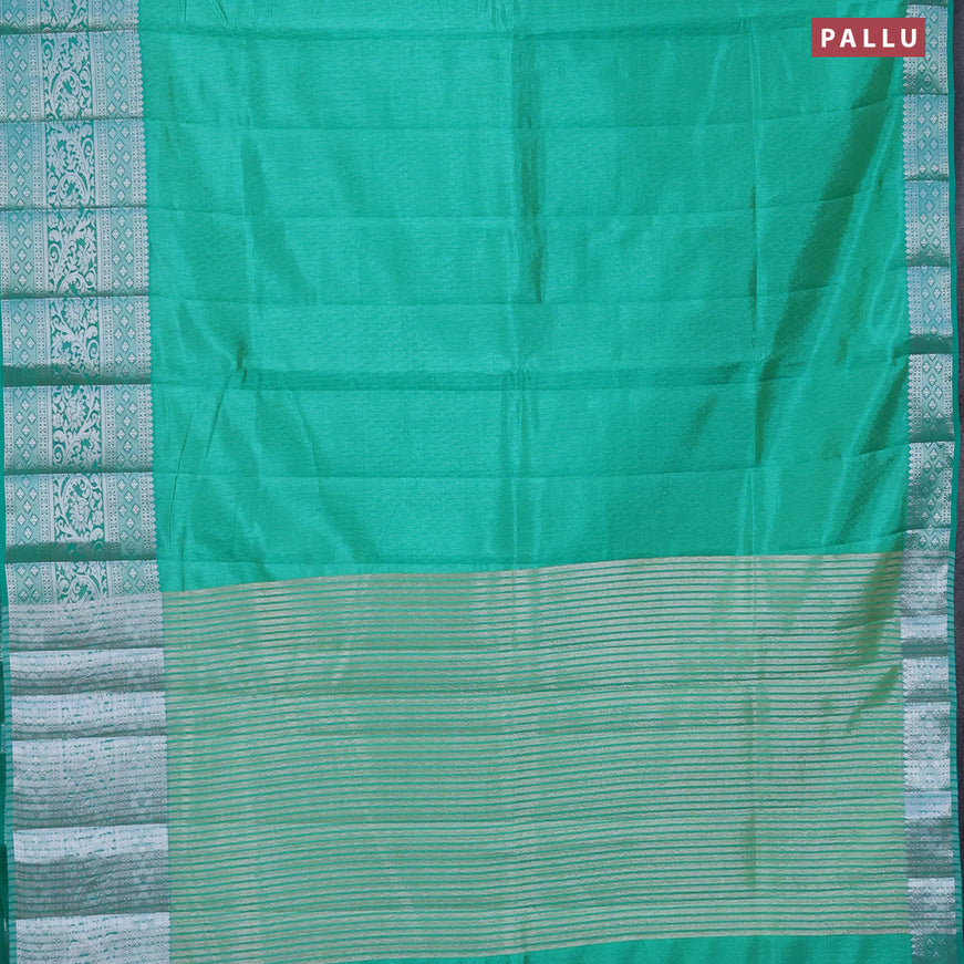 Semi raw silk saree dual shade of teal green shade with allover self emboss and long silver zari woven border