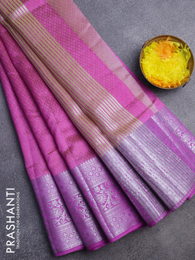 Semi raw silk saree dual shade of lavender with allover self emboss and long silver zari woven border