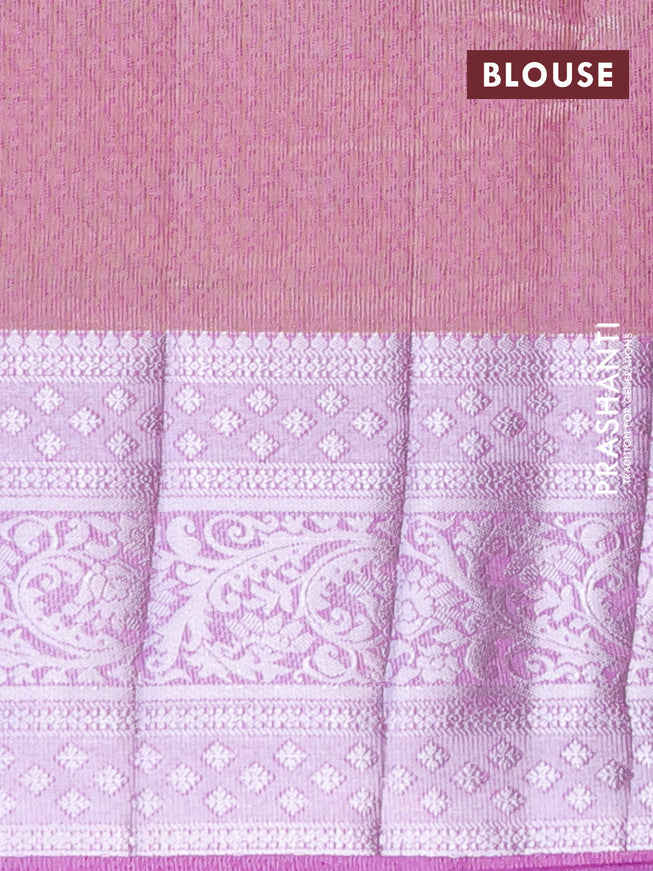 Semi raw silk saree dual shade of lavender with allover self emboss and long silver zari woven border