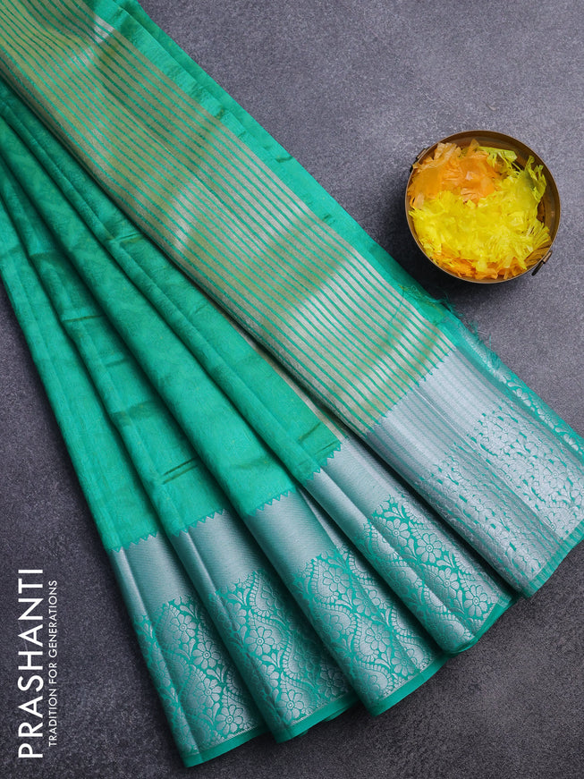 Semi raw silk saree dual shade of teal green with allover self emboss and long silver zari woven border