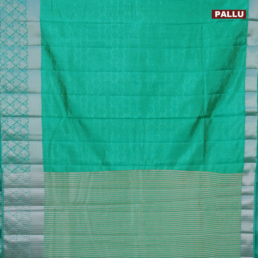 Semi raw silk saree dual shade of teal green with allover self emboss and long silver zari woven border