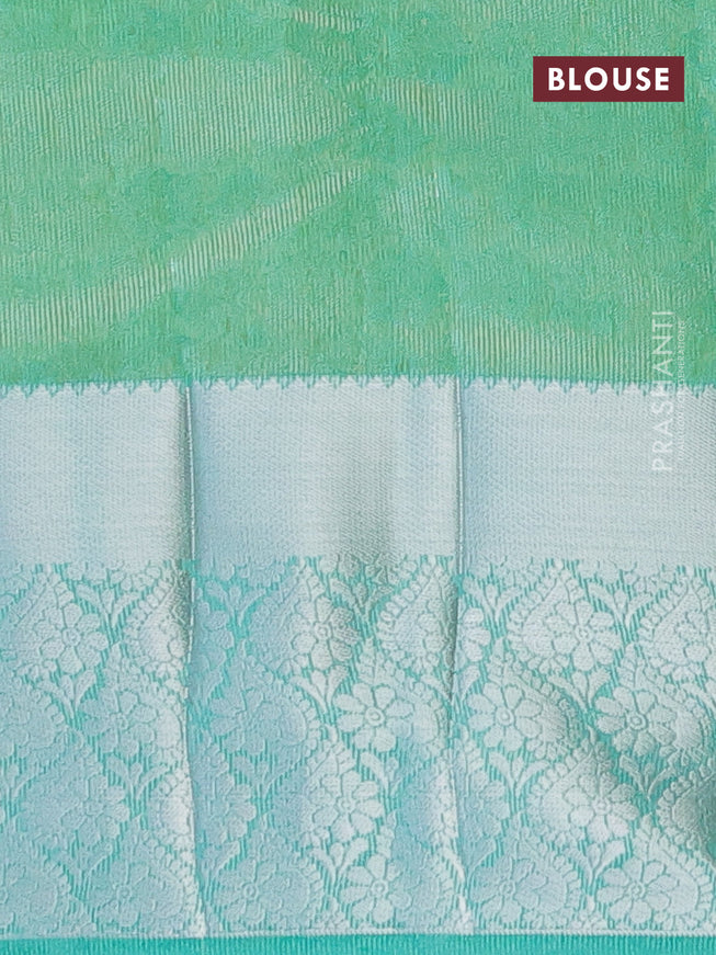 Semi raw silk saree dual shade of teal green with allover self emboss and long silver zari woven border