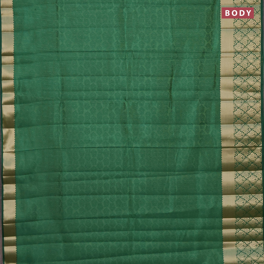 Semi raw silk saree green with allover self emboss and long zari woven border