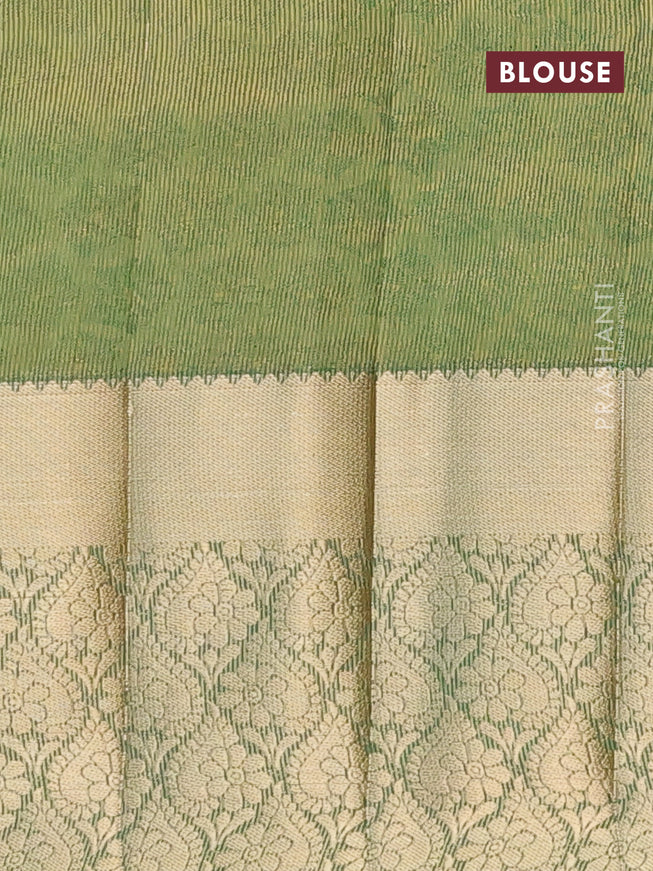 Semi raw silk saree green with allover self emboss and long zari woven border