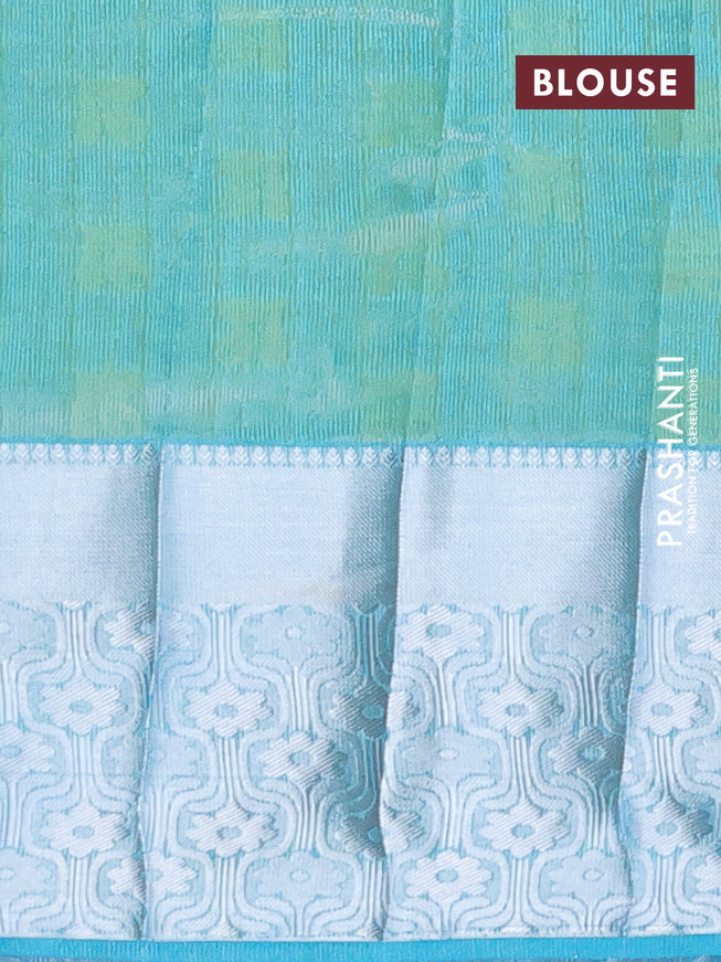 Semi raw silk saree dual shade of teal blue with allover self emboss and long silver zari woven border