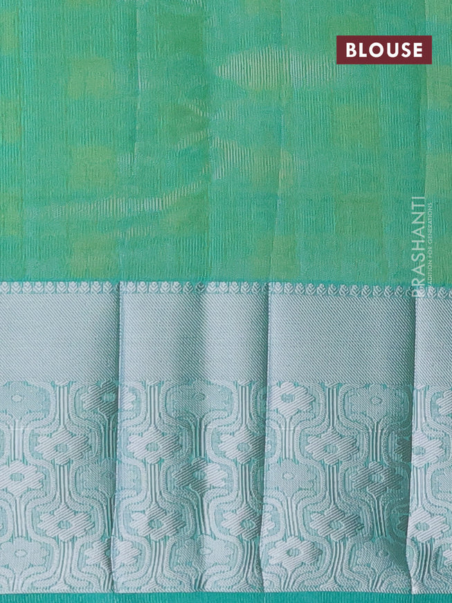 Semi raw silk saree dual shade of teal green with allover self emboss and long silver zari woven border