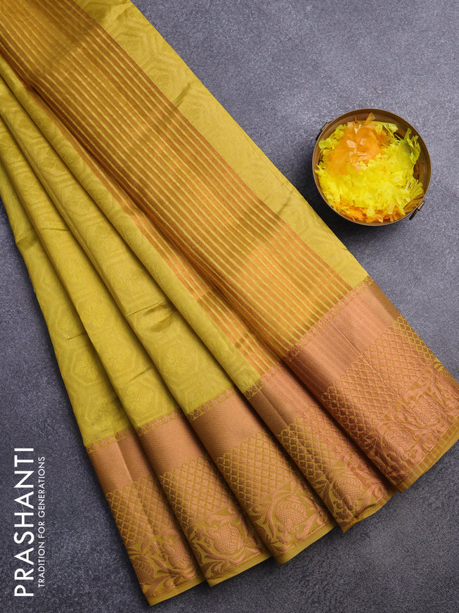 Semi raw silk saree yelloe with allover self emboss and long copper zari woven border