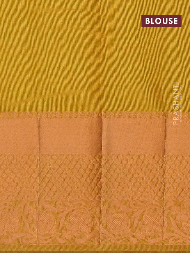 Semi raw silk saree yelloe with allover self emboss and long copper zari woven border