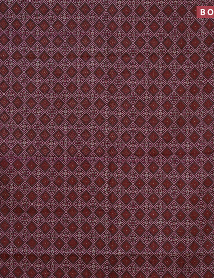 Muslin cotton saree dark magenta and chikku shade with allover ikat prints and zari woven border