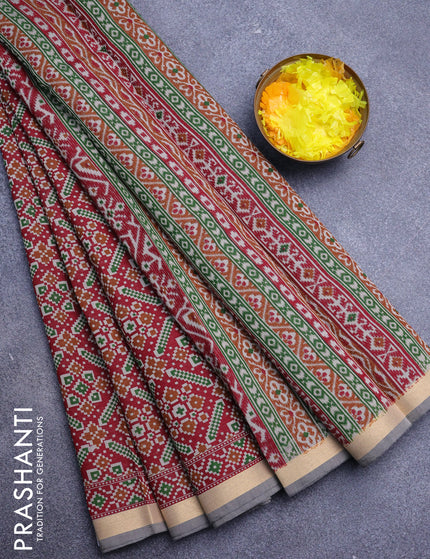 Muslin cotton saree maroon and grey shade with allover ikat prints and zari woven border