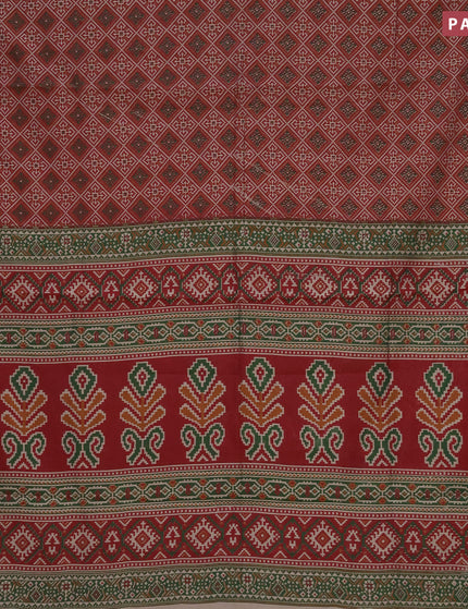 Muslin cotton saree maroon and green with allover ikat prints and zari woven border