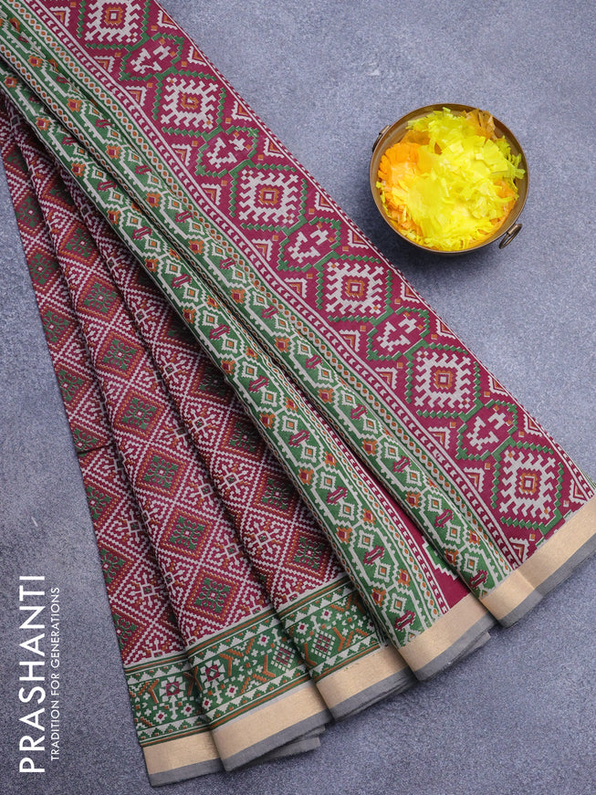 Muslin cotton saree maroon shade and green with allover ikat prints and zari woven border