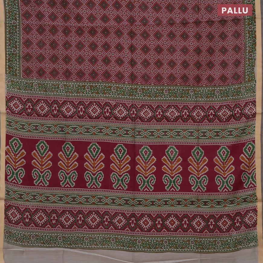 Muslin cotton saree maroon shade and green with allover ikat prints and zari woven border