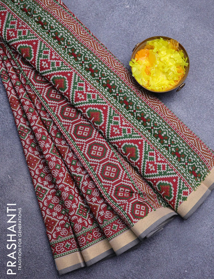 Muslin cotton saree maroon and grey with allover ikat prints and zari woven border