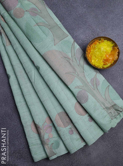 Crush embroidery saree pastel green with allover zari checks & embroidery work buttas in borderless style