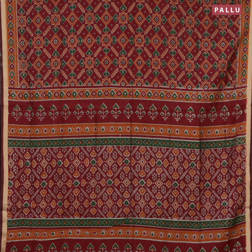 Muslin cotton saree maroon and orange with allover ikat prints and zari woven border