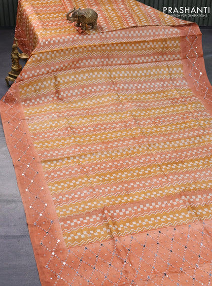 Pure tussar silk saree sandal and pastel peach with allover prints & mirror work and mirror embroidery work border