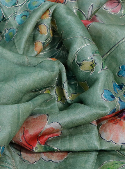 Pure tussar silk saree pastel green shade with allover floral prints & pita work and simple border