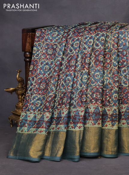 Pure tussar silk saree blue with allover dabu prints & embroidery french knot work and zari woven border