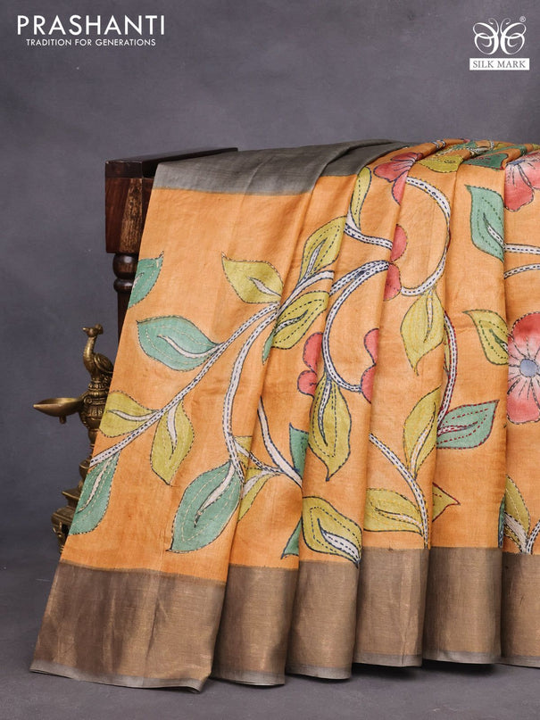 Pure tussar silk saree pale orange and grey with allover kalamkari prints & embroidery work and zari woven border