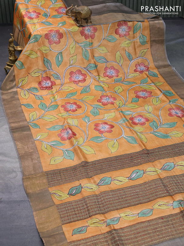 Pure tussar silk saree pale orange and grey with allover kalamkari prints & embroidery work and zari woven border