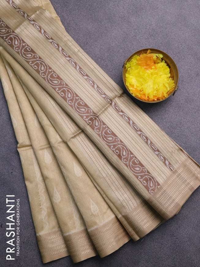 Semi dupion saree sandal with allover prints and zari woven border