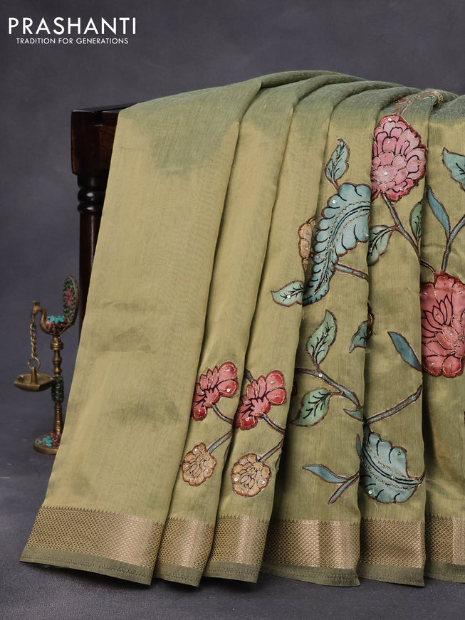 Tissue organza saree green shade with allover kalamkari applique work and zari woven border