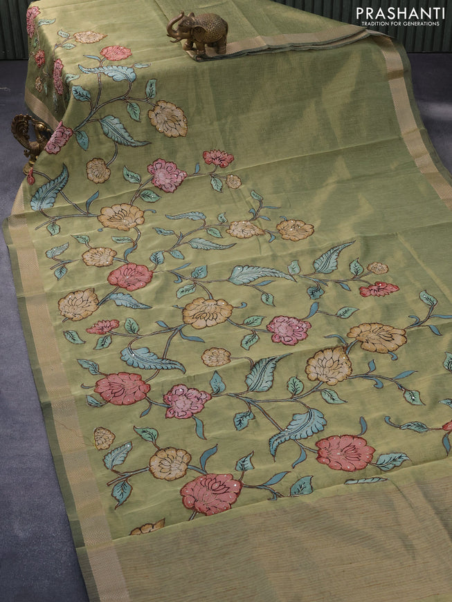 Tissue organza saree green shade with allover kalamkari applique work and zari woven border