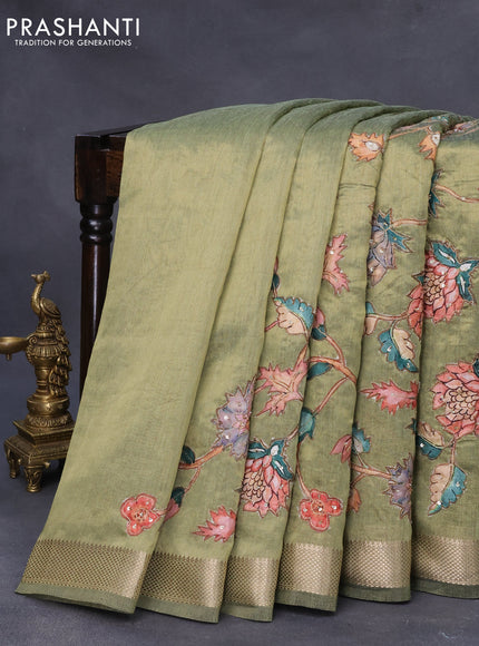 Tissue organza saree olive green with allover kalamkari applique work and zari woven border